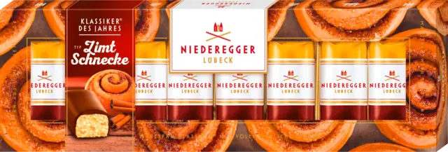 Marzipan Klassiker des Jahres 2025 Zimtschnecke Vollmilch-Schokolade von NIEDEREGGER